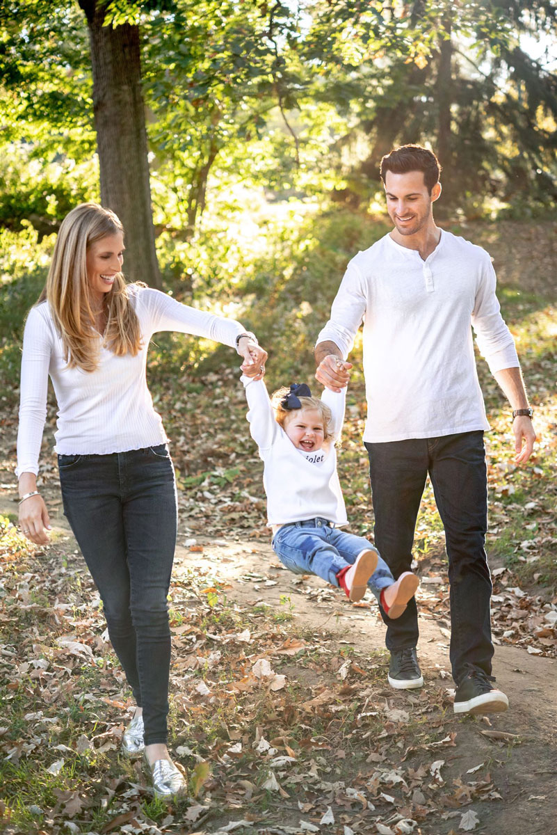 parents walking with child