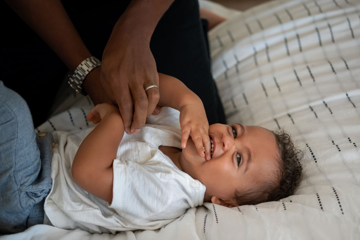 parent playing with toddler