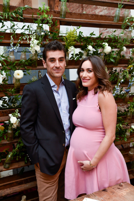 mom and dad to be at a baby shower hosted at maman in nyc