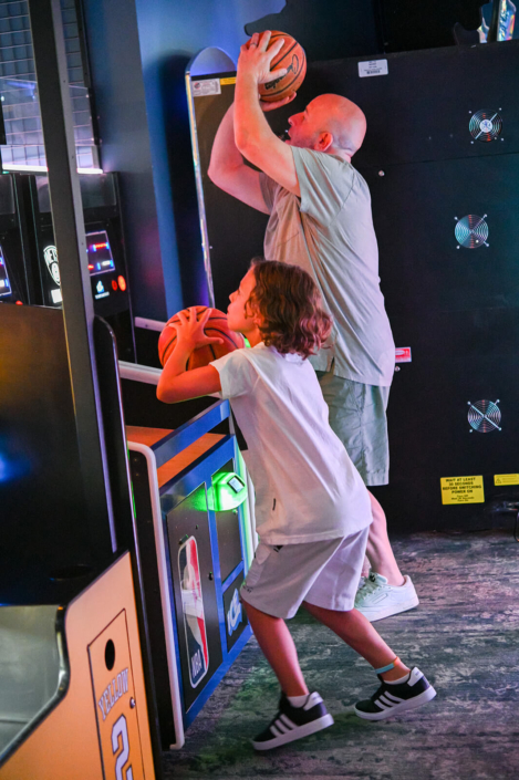 playing arcade games at the clubhouse in east hamptons